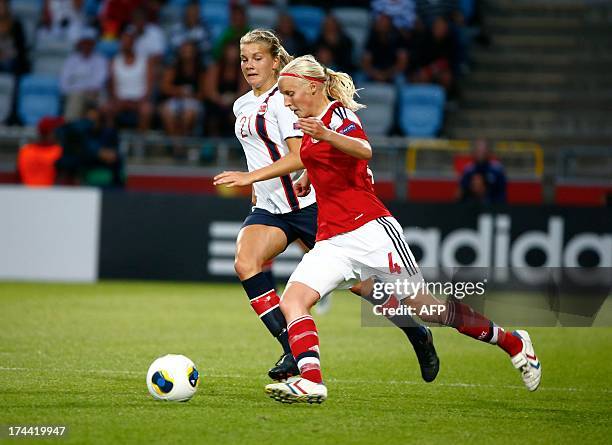 Denmark's Christina Orntoft and Norway's Ada Hegerberg vie for the ball during the UEFA Women's European Championship Euro 2013 semi final football...