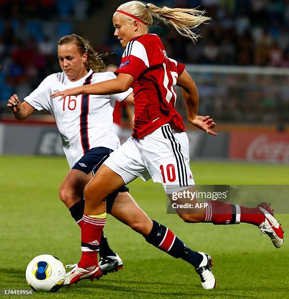 Denmark's Pernille Harder and Norway's Kristina Hegland vie for the ball during the UEFA Women's European Championship Euro 2013 semi final football...