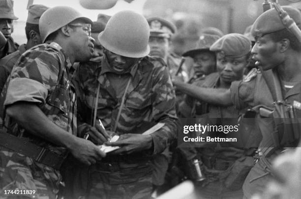 President Mobutu speaking with one of his officers at the airport in Kolwezi, Zaire , May 18th 1978. The airport was recently recaptured from the...