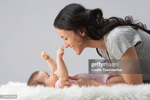 Baby On Rug Baby Laying On Rug Photos and Premium High Res Pictures - Getty Images