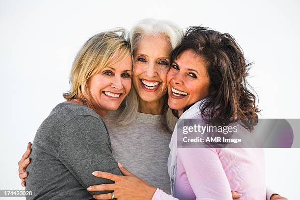 three mature women are best friends for life - three people stock pictures, royalty-free photos & images