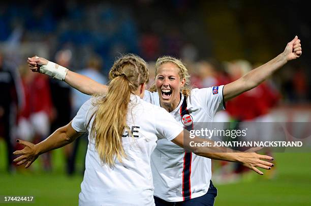 Norway's players celebrate after winning the penalty shootout of the UEFA Women's European Championship Euro 2013 semi final football match Norway vs...