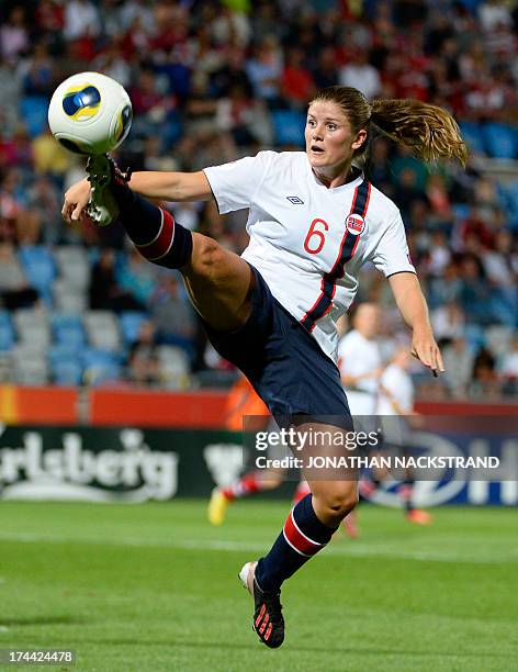 Norway's defender Toril Akerhaugen goes for the ball during the UEFA Women's European Championship Euro 2013 semi final football match Norway vs...