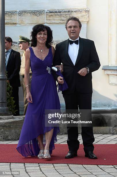 Hans-Peter Friedrich and wife Annette Friedrich attend the Bayreuth Festival opening on July 25, 2013 in Bayreuth, Germany.