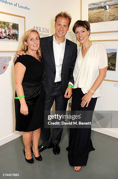 Sentebale CEO Cathy Ferrier, Chris Jackson and Kate Silverton attend the private view of 'Sentebale - Stories Of Hope', showcasing images by Getty...