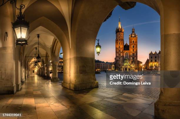 st. mary's basilica, church of st. wojciech, krakow, poland - town hall tower stock pictures, royalty-free photos & images