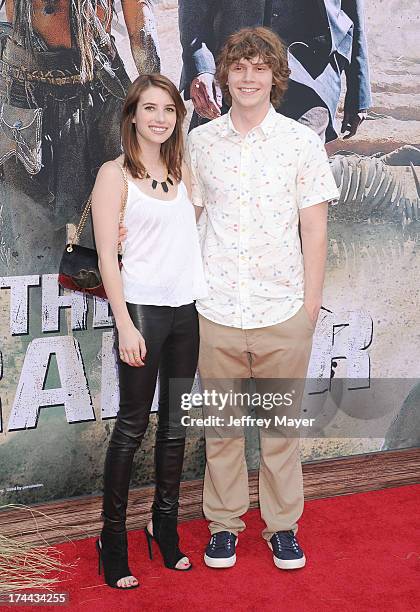 Actors Emma Roberts and Evan Peters arrive at 'The Lone Ranger' World Premiere at Disney's California Adventure on June 22, 2013 in Anaheim,...