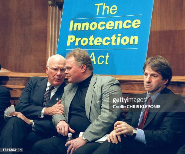 Sen. Patrick Leahy, D-VT, the ranking member of the Senate Judiciary Committee speaks with Kirk Bloodsworth, the first person freed from death row as...