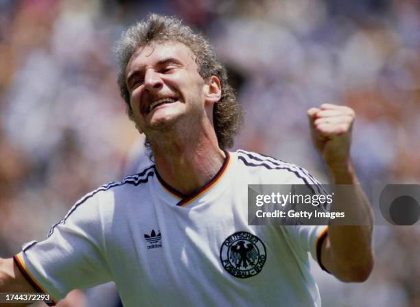 Rudi Voller of West Germany celebrates after scoring the first goal during the 1986 FIFA World Cup match between West Germany and Scotland on June...