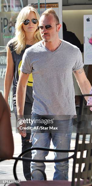 Malin Akerman and Roberto Zincone as seen on July 25, 2013 in Los Angeles, California.