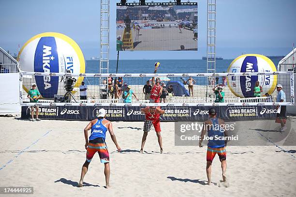 Todd Rogers serves the ball into play to Stafford Slick and Casey Jennings all of USA during the men's elimination round at the ASICS World Series of...