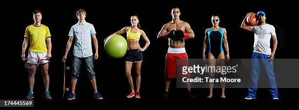 group of sports people in line - posizione sportiva foto e immagini stock