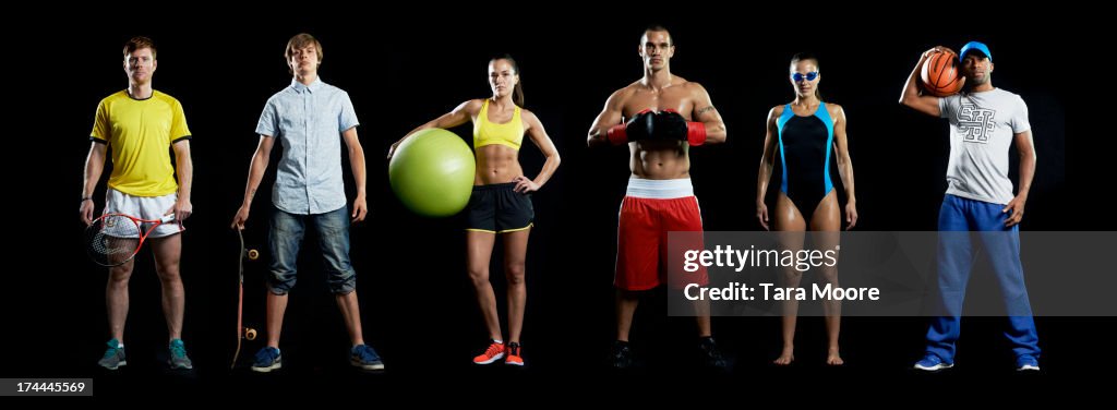 Group of sports people in line
