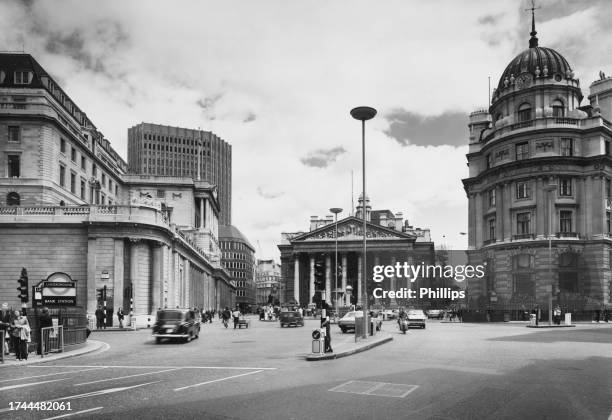 The Bank of England and the London Stock Exchange , with the neoclassical Royal Exchange building , and the offices of the Royal Insurance Group , on...