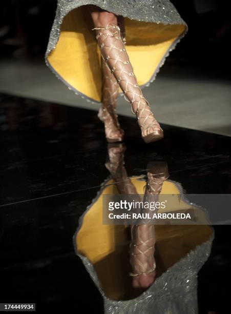 Model presents a creation by Colombia designer Silvia Tcherassi during the Colombiamoda fashion show in Medellin, Antioquia department, Colombia, on...