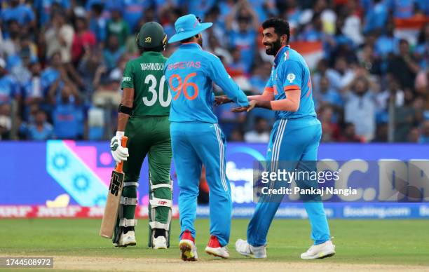 Jasprit Bumrah of India celebrates the wicket of Mahmudullah of Bangladesh during the ICC Men's Cricket World Cup India 2023 between India and...