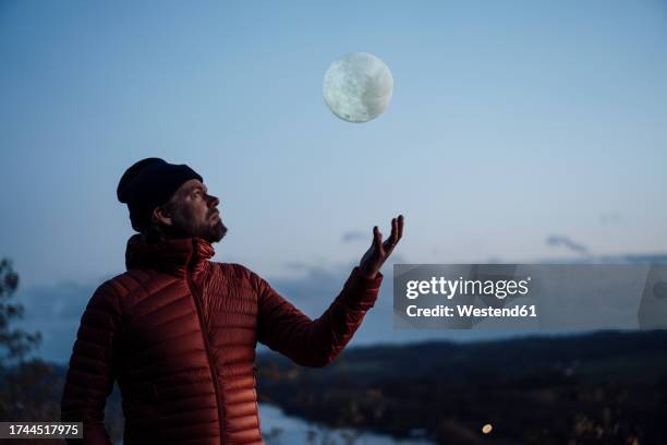 Moonlight Catching Moon Catcher Photos and Premium High Res Pictures - Getty Images