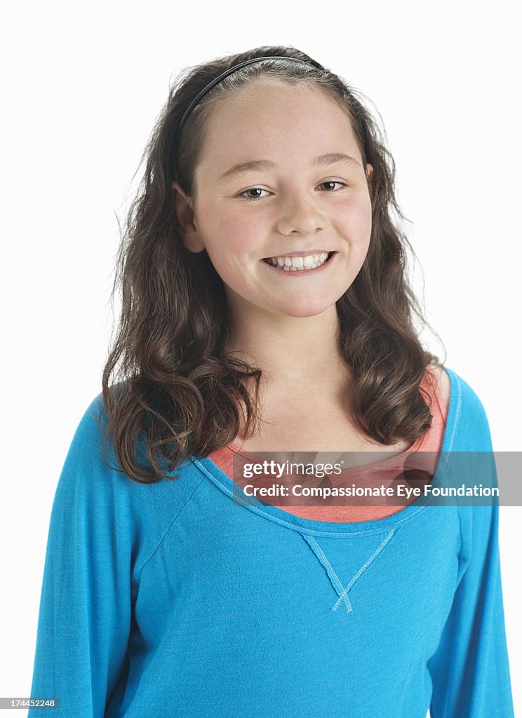 Portrait of smiling girl (11-12)