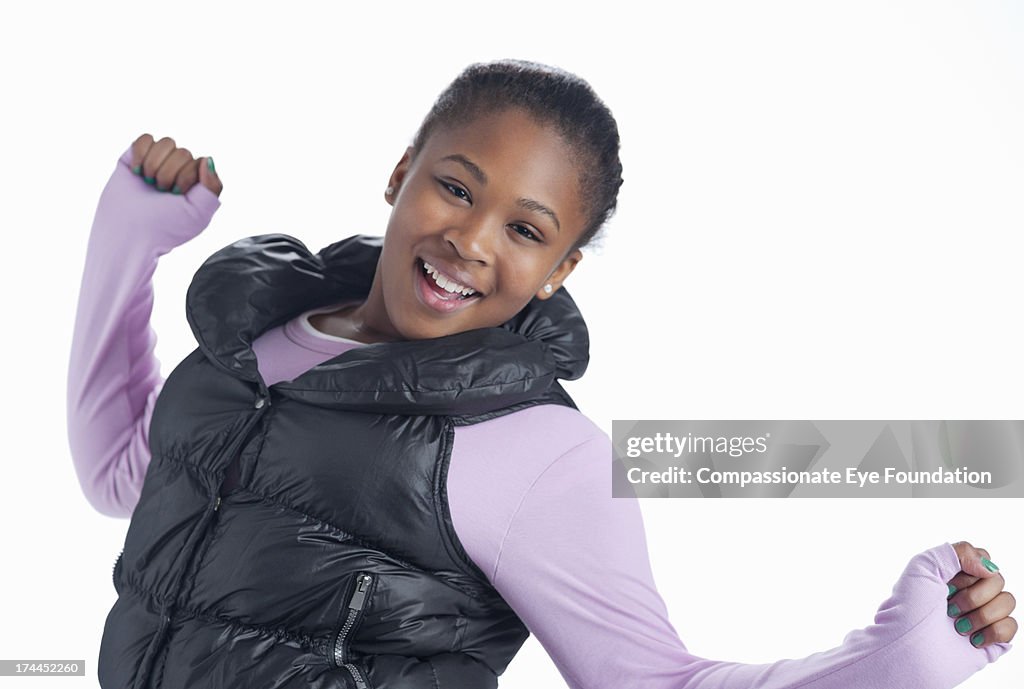 Close up portrait of smiling girl (12-13)