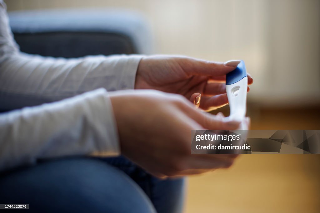 Woman waiting for pregnancy test result