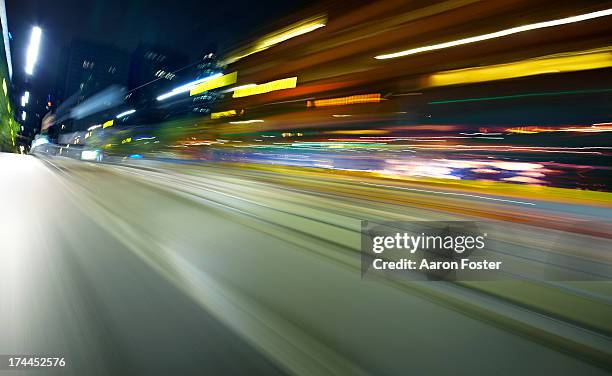 inner city night street - melbourne traffic stock-fotos und bilder