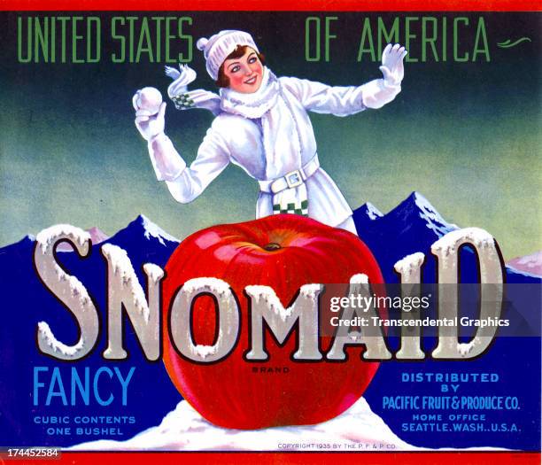 Schmidt Litho produces this apple crate label with a girl and a snowball in1935 in Seattle, Washington.