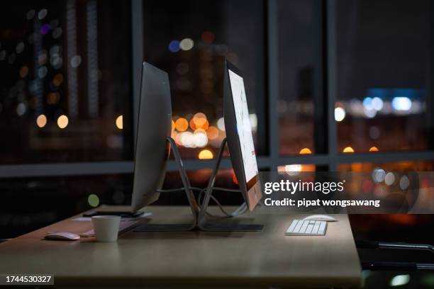 work overtime when the computer is still on at night. - project failure stock pictures, royalty-free photos & images