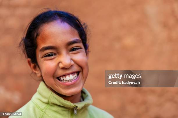 beautiful muslim girl in moroccan kasbah - moroccan girl stock pictures, royalty-free photos & images