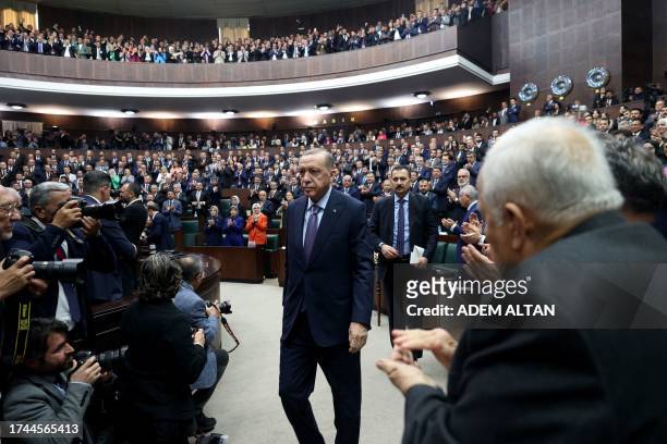 Turkey's President and leader of the Justice and Development Party Recep Tayyip Erdogan attends his party's group meeting at the Turkish Grand...