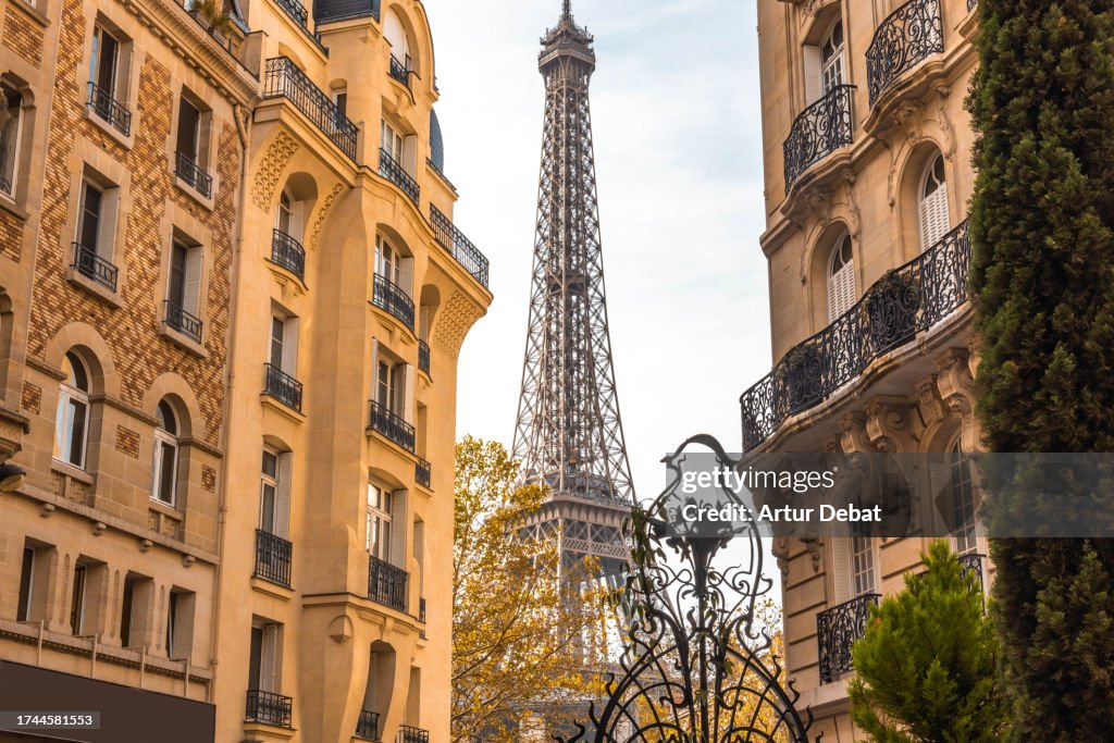 The Eiffel Tower seen from a secret photo location between residential buildings in Paris.