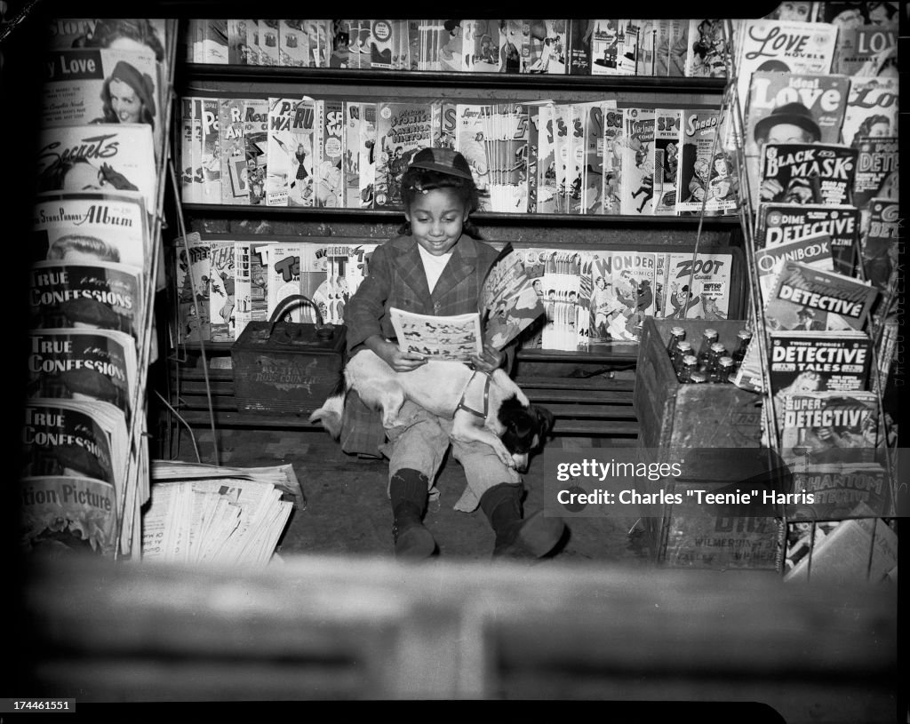 Girl With Comic Book In Store