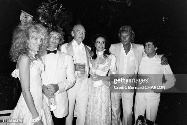 Rod Stewart, Johnny Hallyday et Thierry Le Luron lors du mariage d'Eddie Barclay avec Danièle Poinsot le 1er juin 1982 à Neuilly-sur-Seine