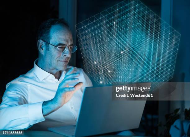 digital composite image of businessman using laptop with 3d cube in office - glass layers office stock illustrations