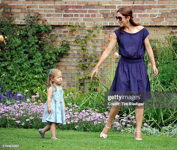 Crown Princess Mary of Denmark and Princess Josephine of Denmark attend the annual Summer photocall for the Royal Danish family at Grasten Castle on...