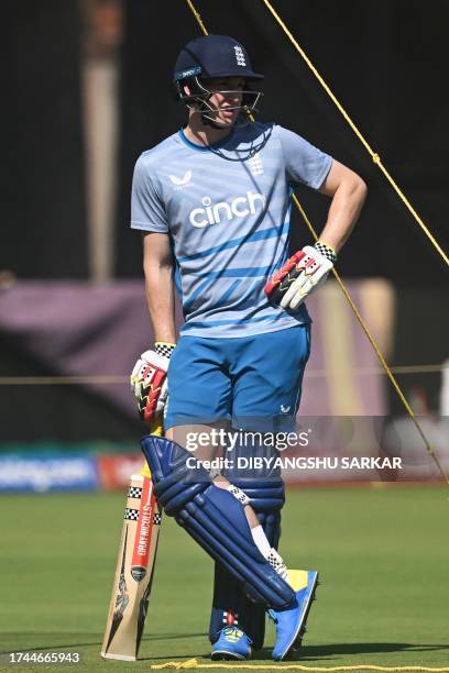 England's Harry Brook waits to bat at the nets during a practice session on the eve of their 2023 ICC Men's Cricket World Cup one-day international...