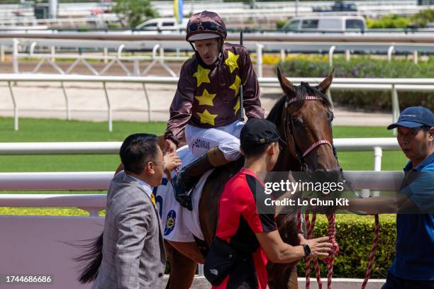 Jockey Hugh Bowman riding Sure Joyful wins the Race 2 So Kon Po Handicap at Sha Tin Racecourse on September 17, 2023 in Hong Kong.