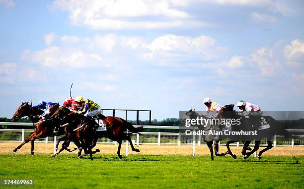 Robert Tart riding Gabbiano win The John Guest Handicap Stakes at Ascot racecourse on July 26, 2013 in Ascot, England.