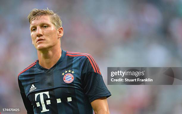 Bastian Schweinsteiger of Muenchen in action during the Uli Hoeness cup match between FC Bayern Munich and FC Barcelona at Allianz Arena on July 24,...