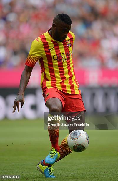 Alexandre Song of Barcelona in action during the Uli Hoeness cup match between FC Bayern Munich and FC Barcelona at Allianz Arena on July 24, 2013 in...