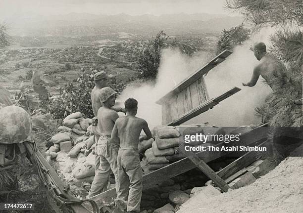 Soldiers destory a position in order not to be reused after the truce signed in August 1953 in South Korea.