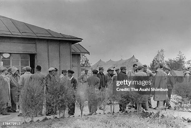 Global media reporters wait for the ceasefire talks in July 1953 in Panmunjom, Korea.