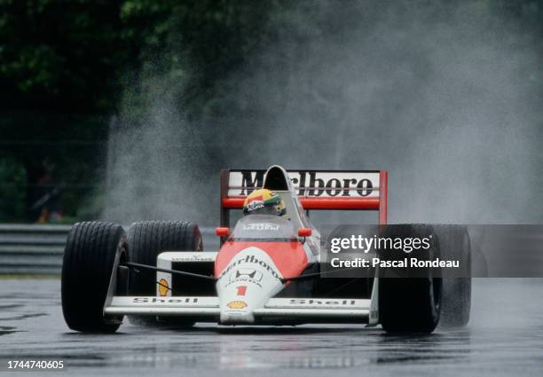 Ayrton Senna from Brazil drives the Honda Marlboro McLaren McLaren MP4/5 Honda V10 in the rain during the Formula One Canadian Grand Prix on 18th...