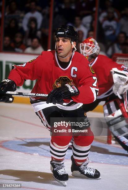 Chris Chelios of the Chicago Blackhawks looks to pass the puck during an NHL game against the Philadelphia Flyers circa 1997 at the Spectrum in...