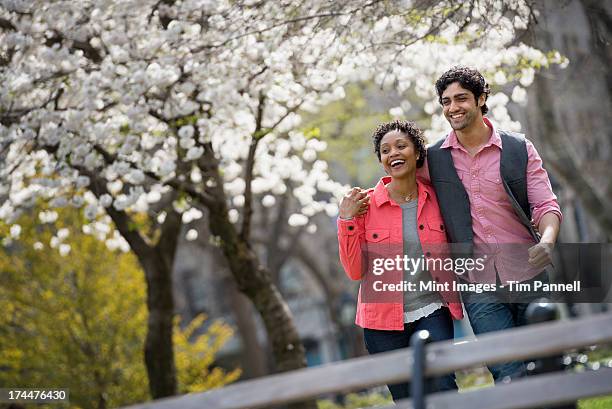 Person Outside Spring Cherry Blossom Spring Walking Photos and Premium High Res Pictures ...