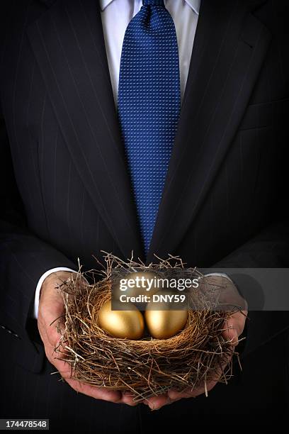 golden eggs - gold investment stock pictures, royalty-free photos & images