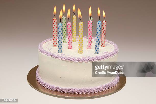 birthday cake with ten colourful candles - birthday cakes stock pictures, royalty-free photos & images