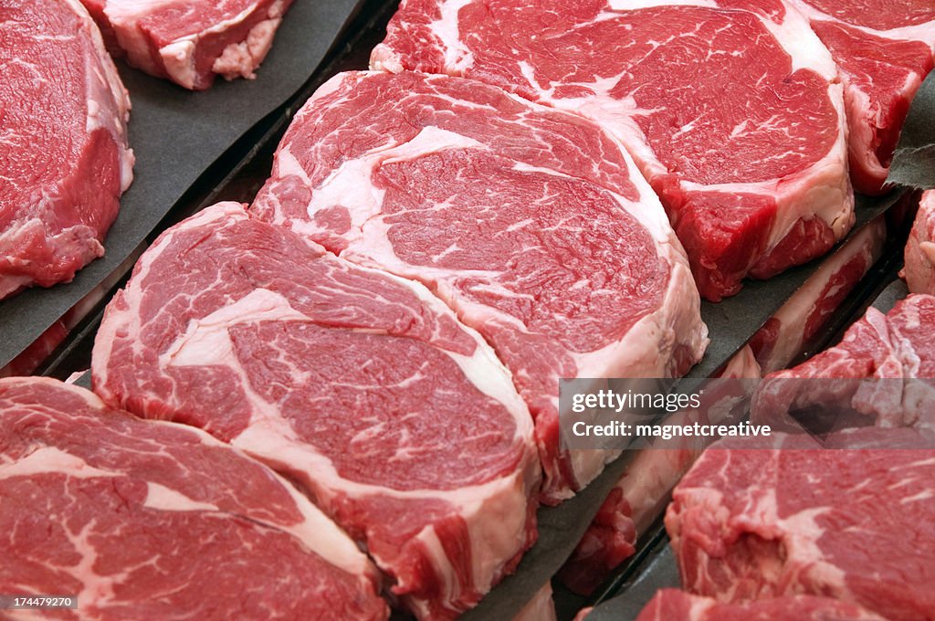 Fresh Ribeye Steaks at the Butcher Shop