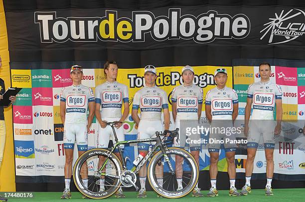Members of the Argos Shimano team pose on stage during the team presentations prior to the Tour De Pologne at Mart Museum on July 26, 2013 in...