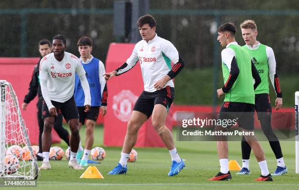 Harry Maguire of Manchester United in action during a first team training session at Carrington Training Ground on October 19, 2023 in Manchester,...