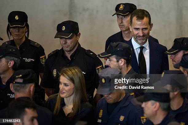 Prince Felipe of Spain and Princess Letizia of Spain visit the Emergency staff members after a train crash killed 78 on July 26, 2013 in Santiago de...